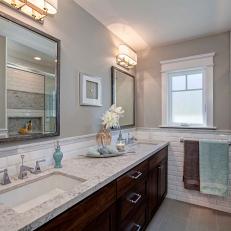 Neutral Double Vanity Bathroom With Blue Towel