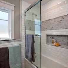 Shower With Gray and White Tiles
