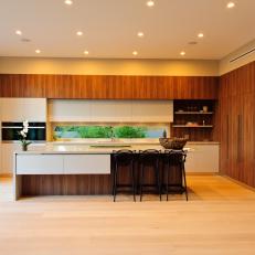 Modern Open Plan Kitchen With Brown and White Accents