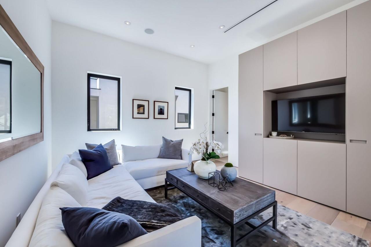 Neutral Modern Media Room With Blue Pillows Hgtv Modern Media Room With Blue Pillows