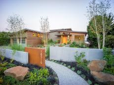 Contemporary Front Yard Landscaping With Rocks, Mulch & Green Plants