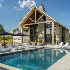 Contemporary Pool Surrounded by Bluestone Patio