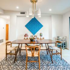 Midcentury Dining Room With Rug