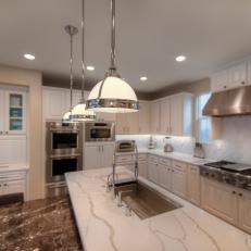 White Chef Kitchen With Marble Countertop