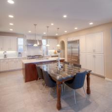 White Eat-In Kitchen With Gray Table