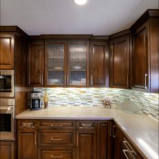 Wooden Cabinets and Tile Backsplash in Contemporary Kitchen