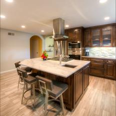 Contemporary Kitchen With Granite Topped Kitchen Island