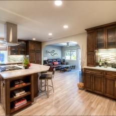 Contemporary Kitchen With Wooden Cabinets and Granite Topped Kitchen Island