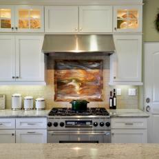 Rolling Waves Painting Above Stove Brings Beachy Feel to Kitchen Design