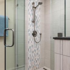 Strip of Tile Adds Interest and Color to the Master Shower