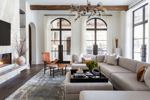 Oversized Sectional and Matching Ottoman in Transitional Living Room
