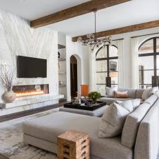 Neutral Transitional Living Room With Arched Windows