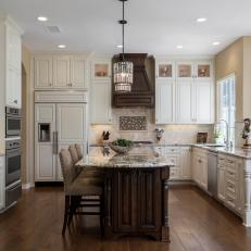 White Traditional Open Kitchen With Brown Island