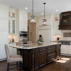White Traditional Chef Kitchen With Brown Range Hood