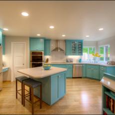 Blue Corner Kitchen With Wood Floors