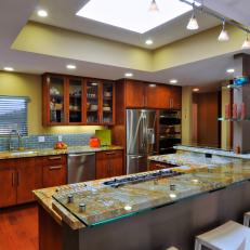 Yellow Open Plan Kitchen With Skylight