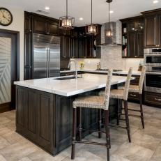 Open Plan Neutral Kitchen With Wall Clock