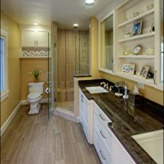 Yellow Bathroom With Corner Walk-In Shower