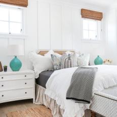 White Cottage Bedroom With Blue Lamp