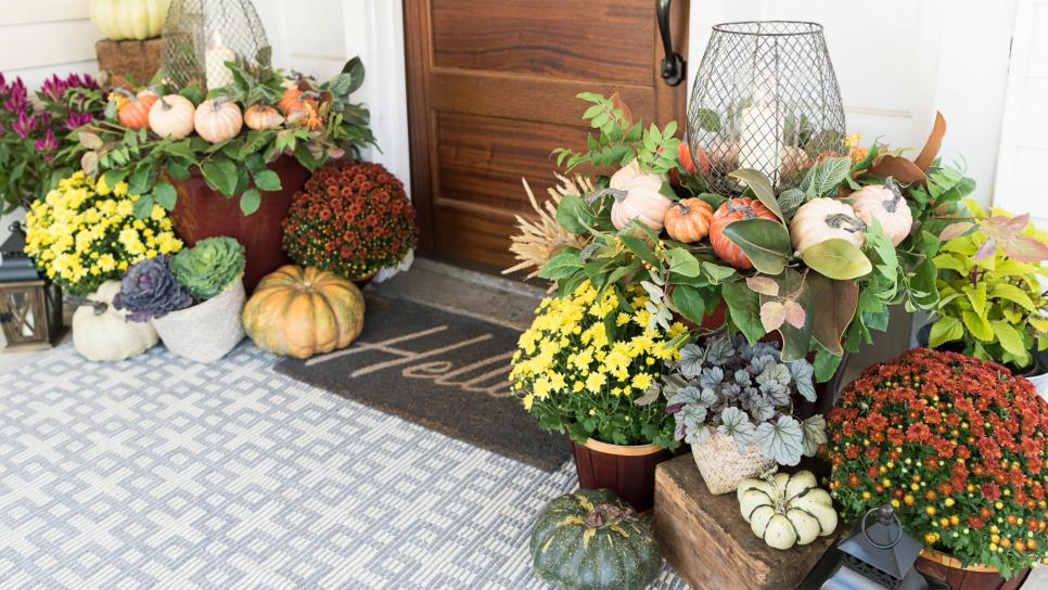Fall Front Porch With Mums and Candle Lanterns