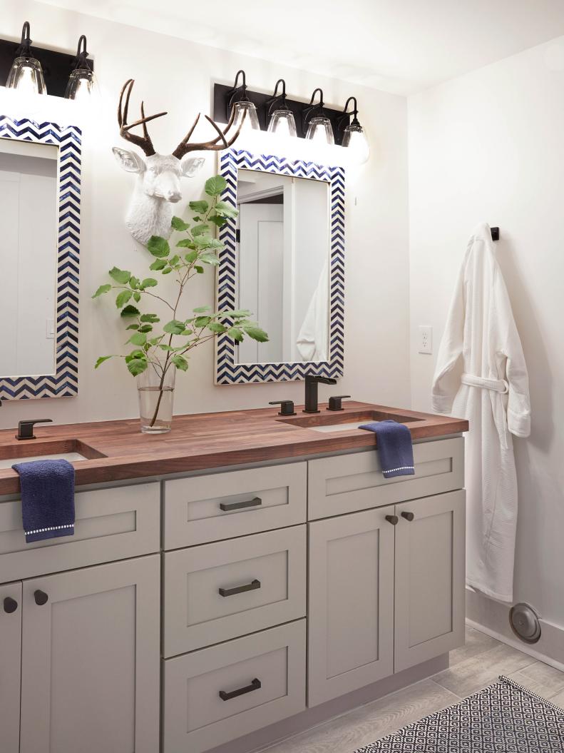Bathroom With Striped Mirrors