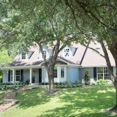 Gray Traditional Home Exterior with White Trim  