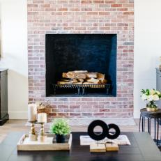 Reclaimed Brick Fireplace Adds Character and Warmth to Modern Farmhouse Living Room