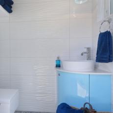 Poolhouse Bathroom With Blue Vanity
