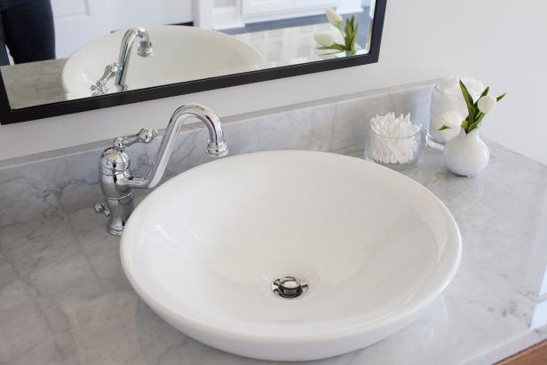 The Ward’s main bathroom has new sinks, as seen on Fixer Upper. (After)