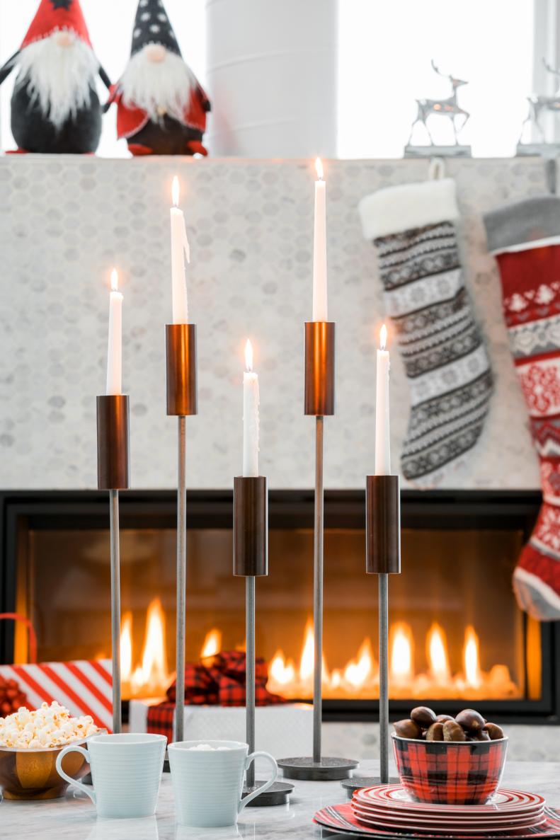 Candlelight, firelight, and the twinkle of white holiday lights create a warm, inviting atmosphere in any room. Be sure to use unscented candles in any space where you’ll be serving holiday goodies so heavy fragrances won’t compete with the aromas and fragrances of your delicious foods.