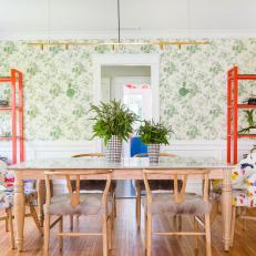 Eclectic Dining Room With Leaf Wallpaper