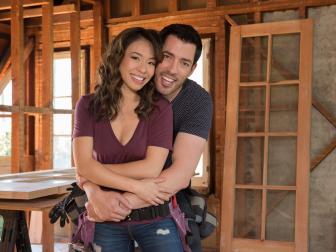 Host Drew Scott and fiancee Linda pause in Drew's honeymoon house, which is undergoing an extensive remodel ahead of Drew and Linda's upcoming wedding, as seen on Property Brothers at Home: Drew's Honeymoon House.
