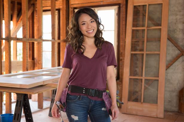 Host Drew Scott's fiancee Linda pauses in Drew's honeymoon house, which is undergoing an extensive remodel ahead of Drew and Linda's upcoming wedding, as seen on Property Brothers at Home: Drew's Honeymoon House.