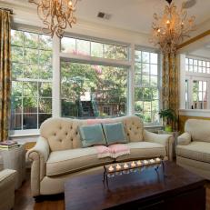 Gold Traditional Family Room With Tufted Sofa