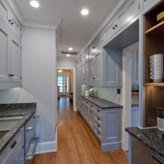 Gray Butler's Pantry With Wood Floor