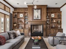 Grand Floor-to-Ceiling Fireplace With Built-In Bookshelves 