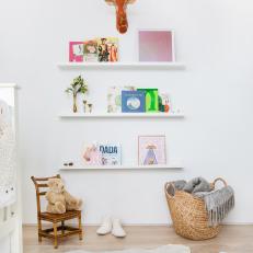 White Nursery With Floating Bookshelves