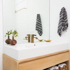 Single Vanity Bathroom With Gray Hand Towel