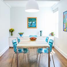 Contemporary Dining Room with Bold Blue Accents
