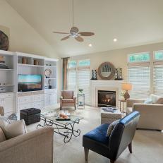Neutral Transitional Living Room With Round Mirror