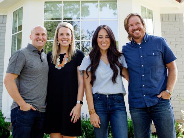 As seen on Fixer Upper, the Sandvall's with Chip and Joanna Gaines in fron tof their remodeled home. (Portrait)