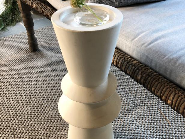 White Concrete Hurricane Table on Covered Porch