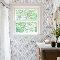 Contemporary White Bathroom with Black and White Patterned Wallpaper 