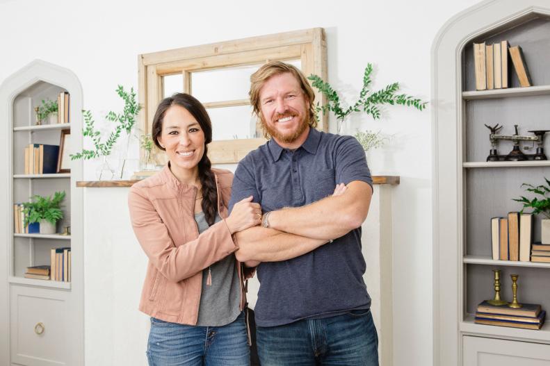 As seen on Fixer Upper, Chip and Joanna Gaines in the Scivano's remodeled living room. (Portrait)