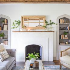 Contemporary White Living Room with Neutral Exposed Beams 