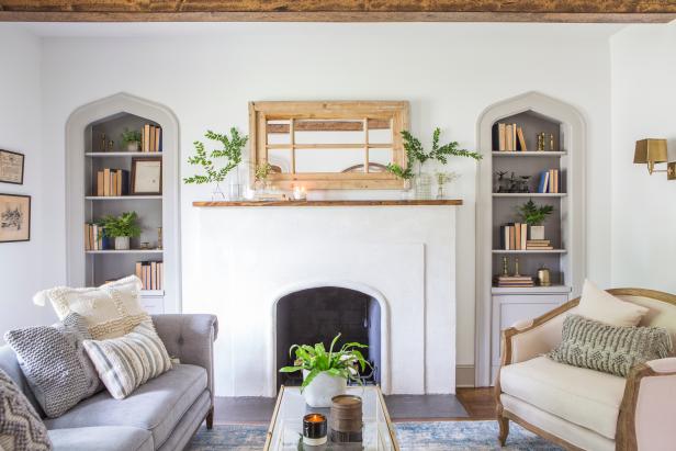 White Living Room with Neutral Exposed Beams and White Fireplace