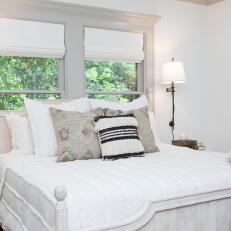Contemporary White Master Bedroom with Gray Window Trim 