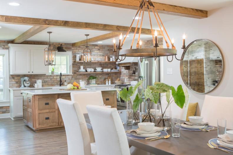 White Open Concept Kitchen with Neutral Exposed Beams  