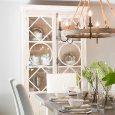 White Rustic Dining Room with Wrought-Iron Chandelier 
