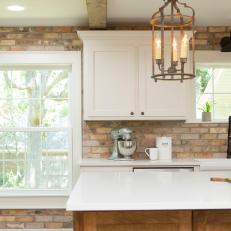 Rustic Neutral Kitchen with Brown Brick Pavers  